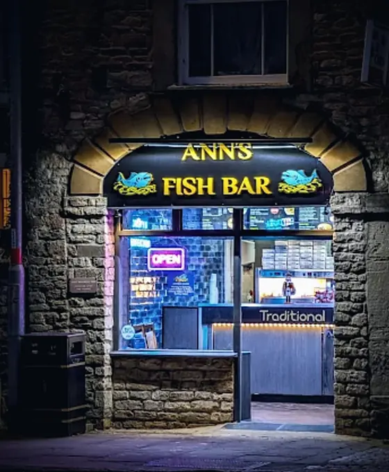 Ann's Fish Bar lit up at night
